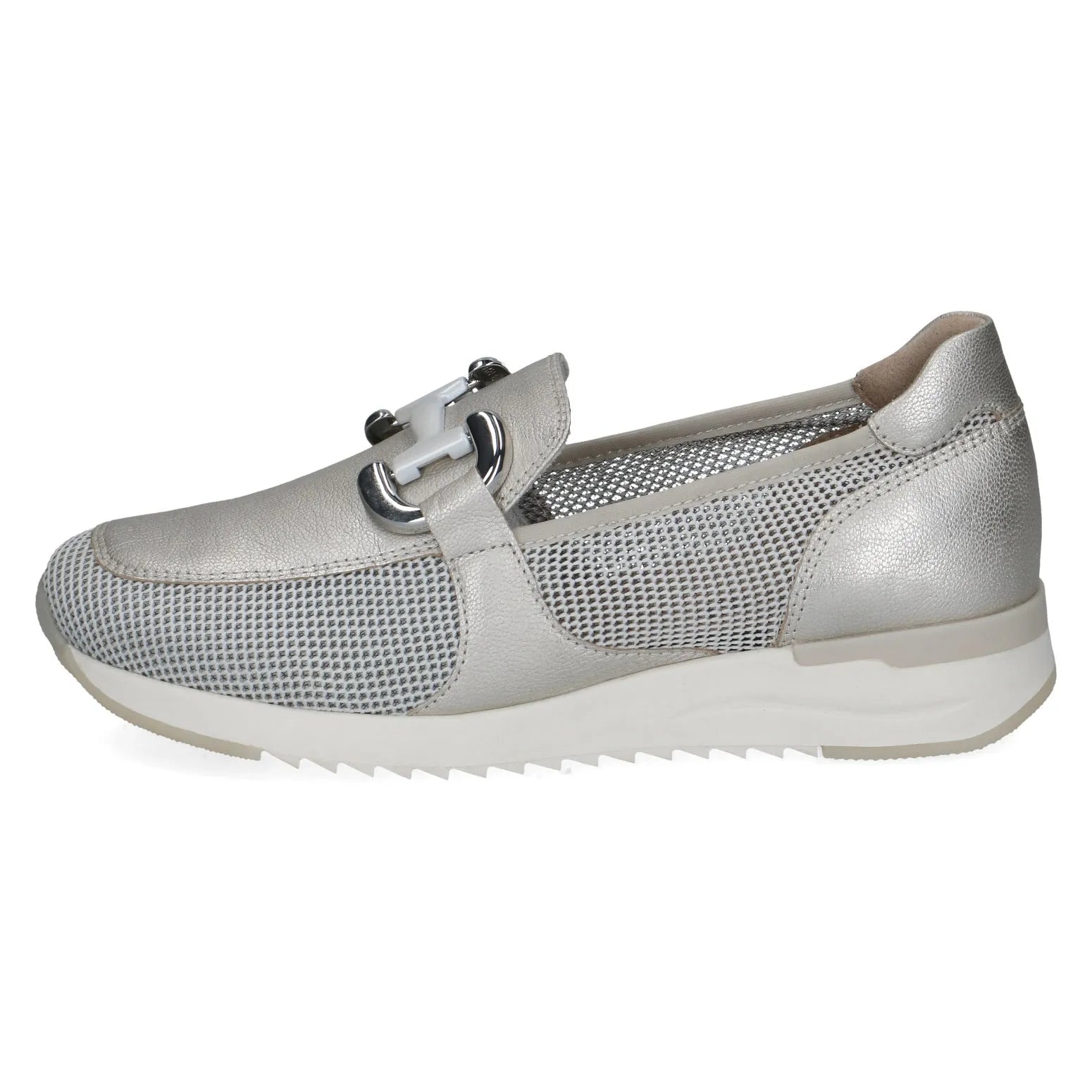 Caprice ladies slip-on shoes with leather and textile upper, silver color, perforated details, and sporty sole.