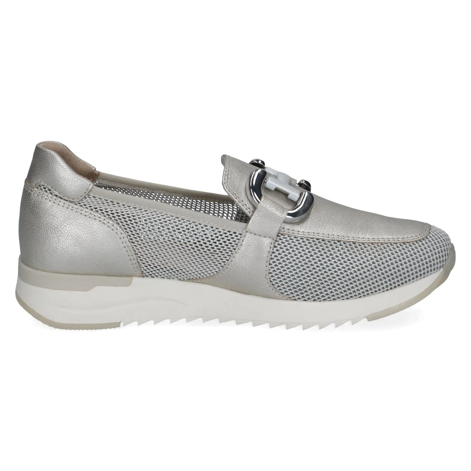 Ladies silver slip-on shoes with leather, textile, and perforated details, silver buckle, and white sole.