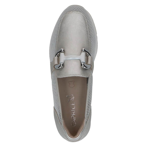 Ladies platinum slip-on shoes with leather and textile upper, metal buckle detail, rounded toe, and cushioned insole.