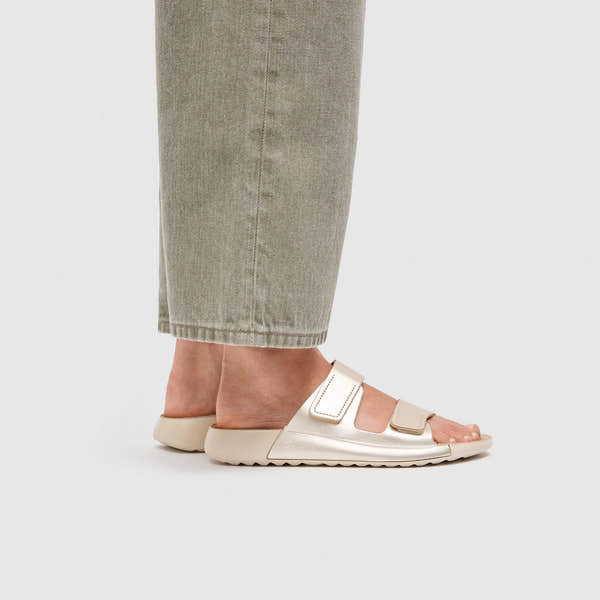 Ecco Cozmo W 2-Strap ladies white gold leather touch fastening sandals, open-toe, slip-on design with adjustable straps.