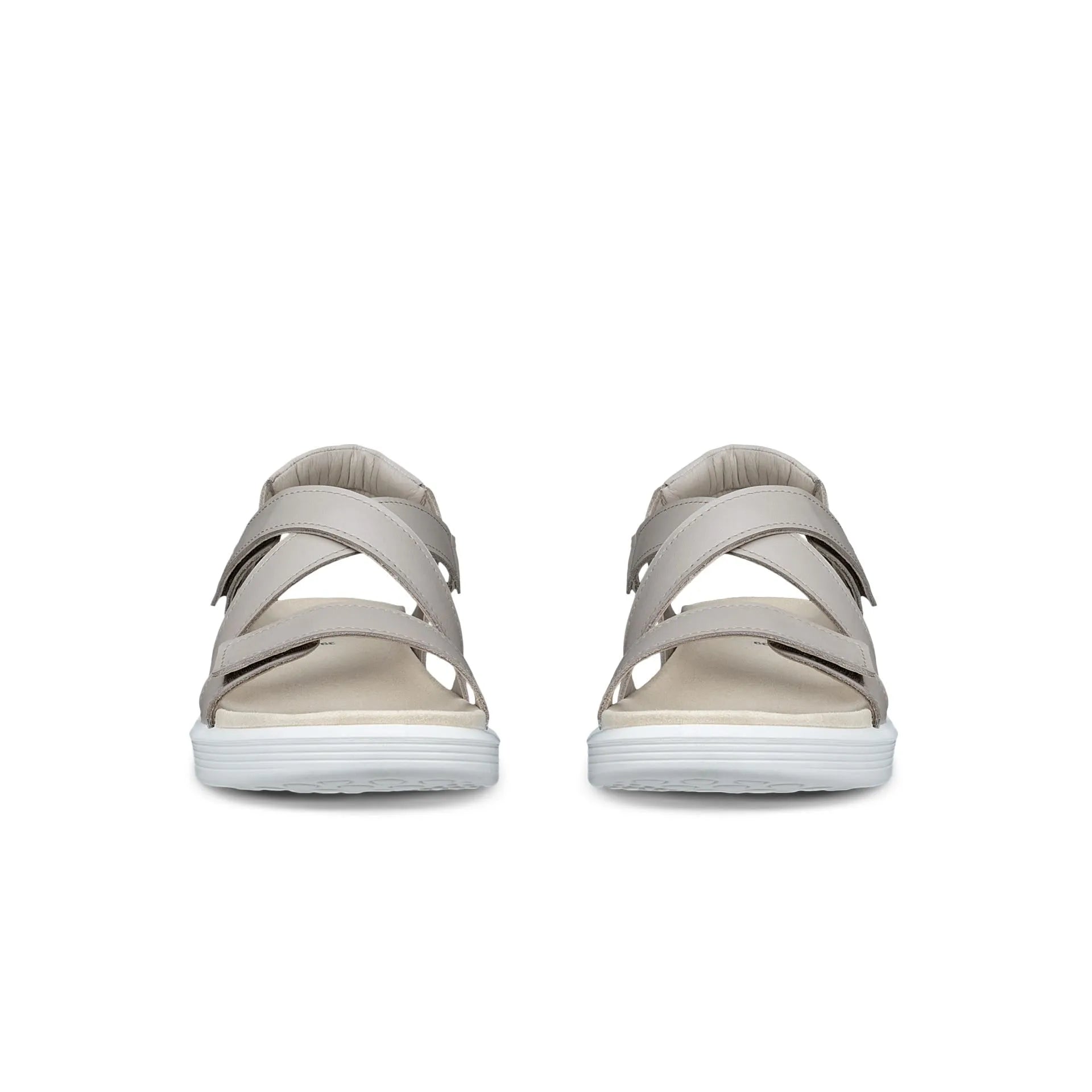 Pair of beige sandals on a white background