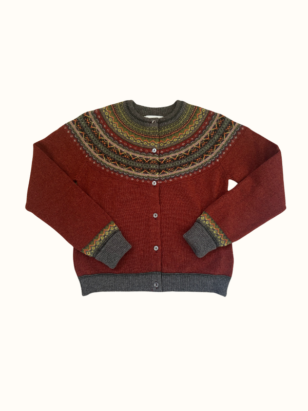 Eribe Alpine Short Cardigan in Copperleaf, Nordic-inspired pattern, red and green tones, ribbed cuffs and hem, button closure.