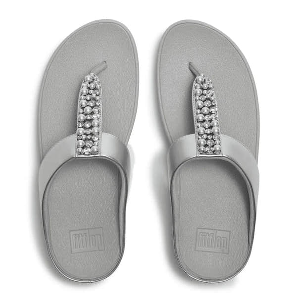 FitFlop A2N-011 Fino Pearls women’s silver T-strap sandals with pearl embellishments and cushioned footbed.