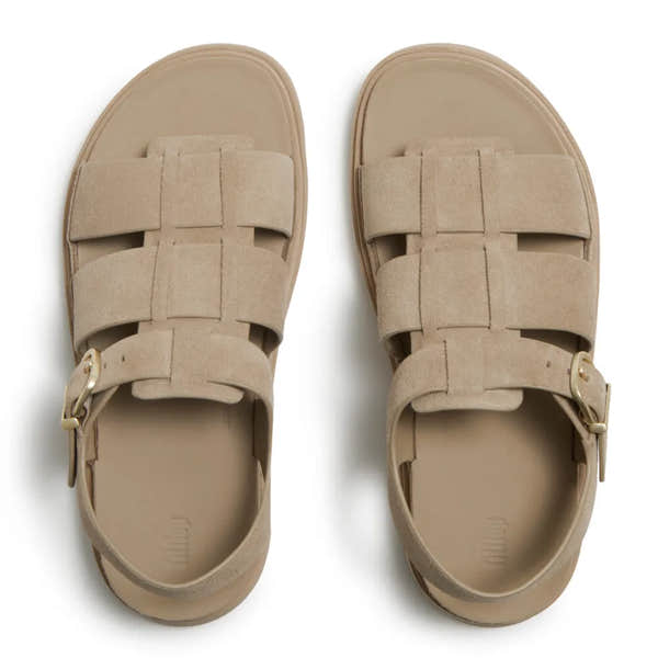 FitFlop ladies' cappuccino suede Fisherman sandals with buckle strap, cushioned footbed, and stylish design.