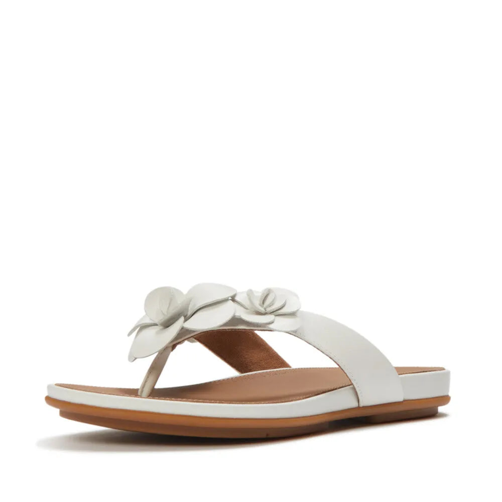 FitFlop A4A-194 Gracie Flower women's white leather T-strap sandals with floral embellishments, flat sole for casual urban style.