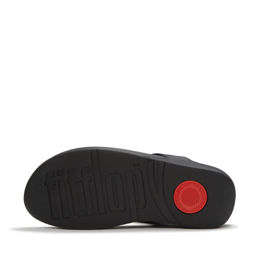 FitFlop Lulu marbled stone black T-strap sandals with cushioned sole and red logo detail, women’s fashionable flat footwear.