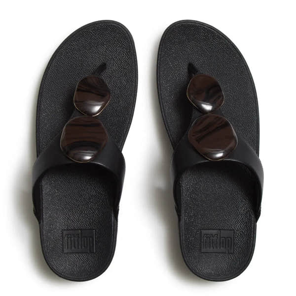 FitFlop Lulu marbled stone black T-strap ladies sandals with chunky stones, open toe, and slip-on design.