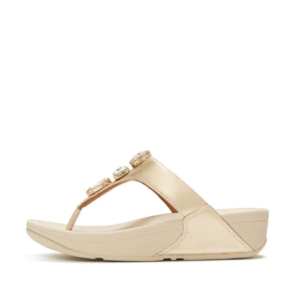 FitFlop Lulu Ultra-Jewel Ladies Platino T-bar Sandals with jewel embellishments and cushioned sole, in metallic platinum color.