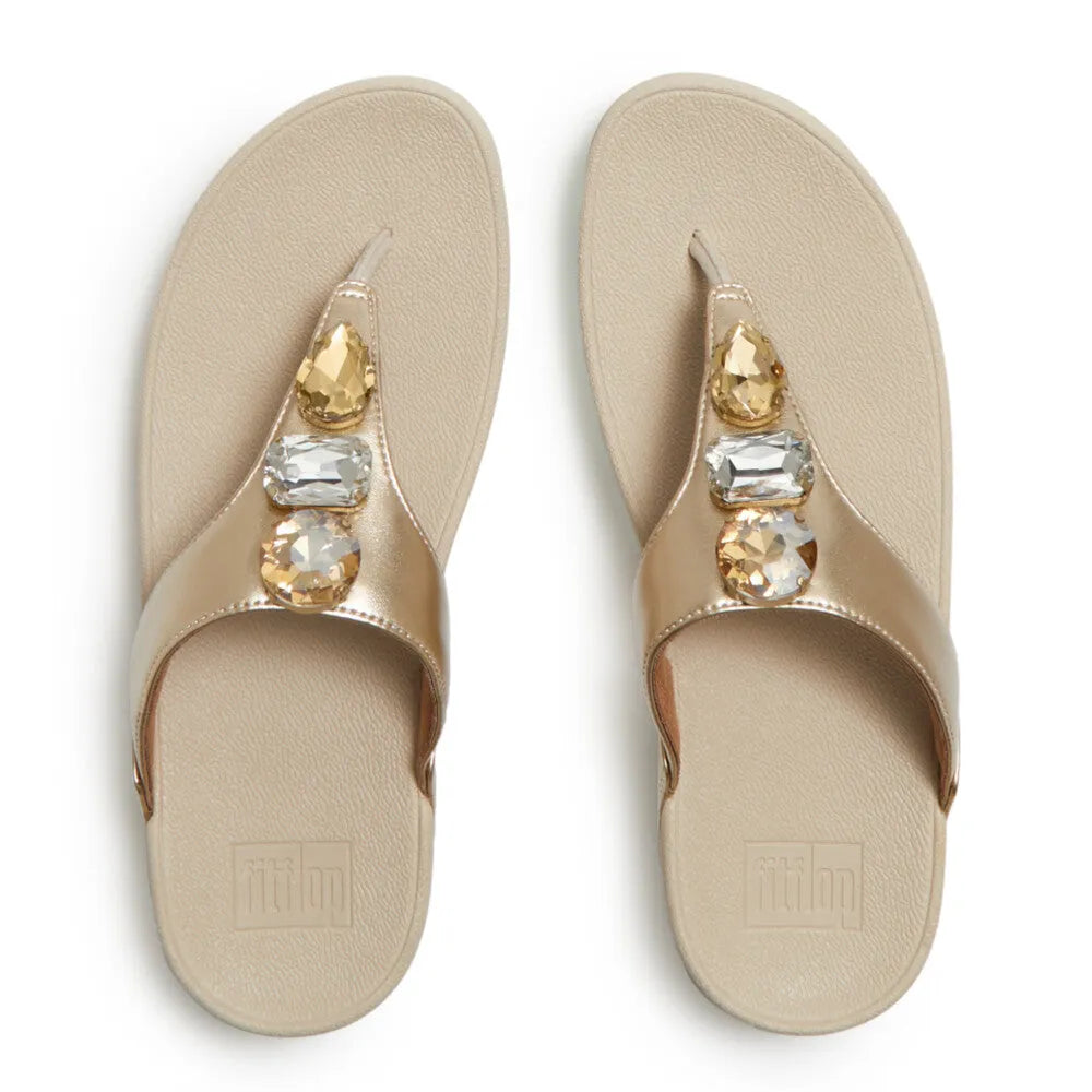 FitFlop Lulu Ultra-Jewel Ladies Platino T-bar Sandals with jeweled embellishments and comfortable sole.