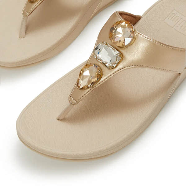 FitFlop Lulu Ultra-Jewel Ladies Platino T-bar Sandals with rhinestone embellishments and metallic finish.