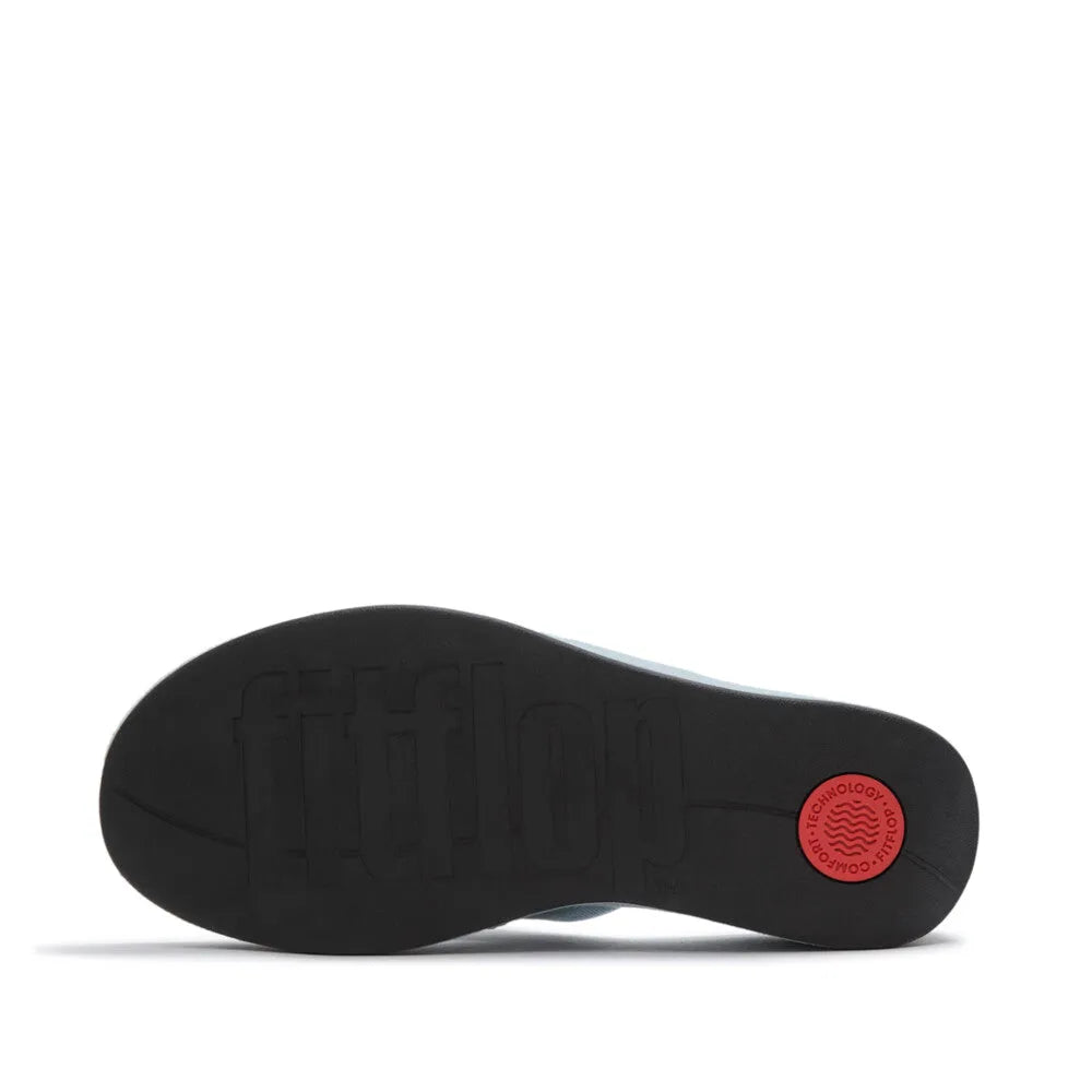 FitFlop ladies light denim textile platform T-bar sandals with cushioned footbed and slip-resistant outsole.