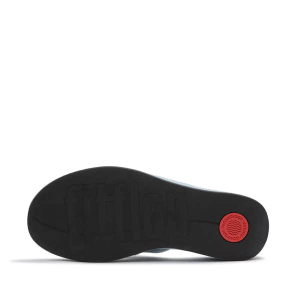 FitFlop ladies light denim textile platform T-bar sandals with cushioned footbed and slip-resistant outsole.