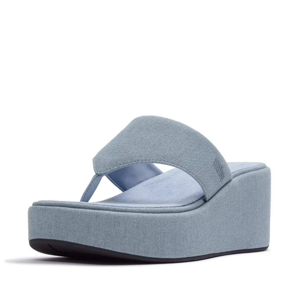 FitFlop A5H-E01 women's light denim textile platform T-strap sandals with cushioned footbed and wedge heel.