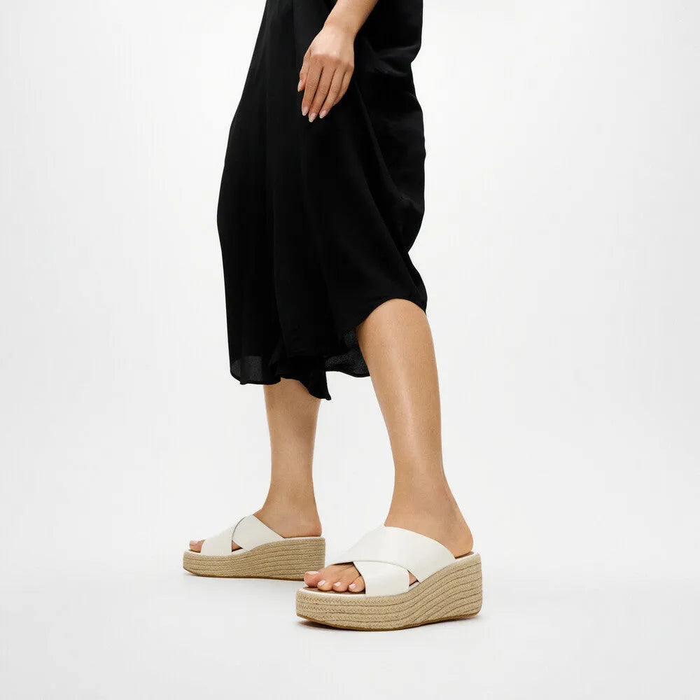FitFlop A5K-194 platform espadrille women's white leather slider sandals with wedge sole.