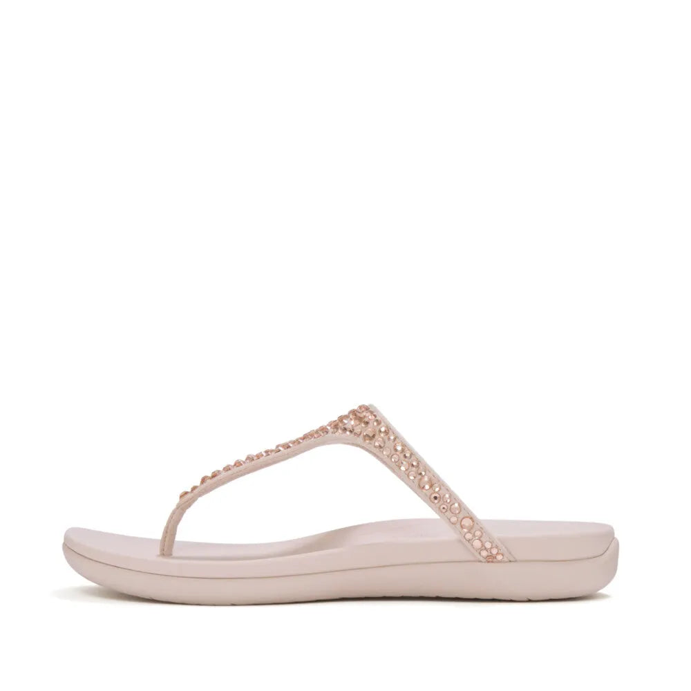 FitFlop Solay women's nude rose T-strap sandals with mixed crystals, cushioned sole, and fashionable design.
