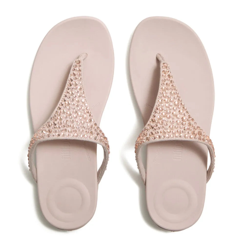 FitFlop Solay women's nude rose T-strap sandals with mixed crystals and cushioned footbed.