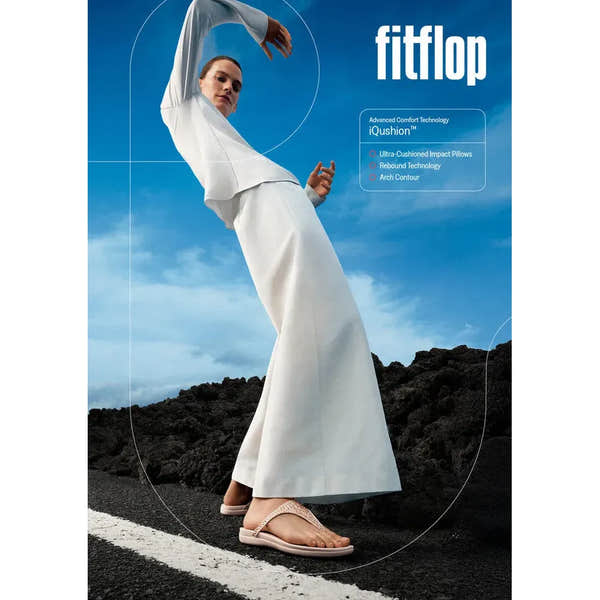 FitFlop A5Y-C53 Solay mixed-crystal nude rose T-strap sandals outdoors, featuring cushioned comfort and arch support.