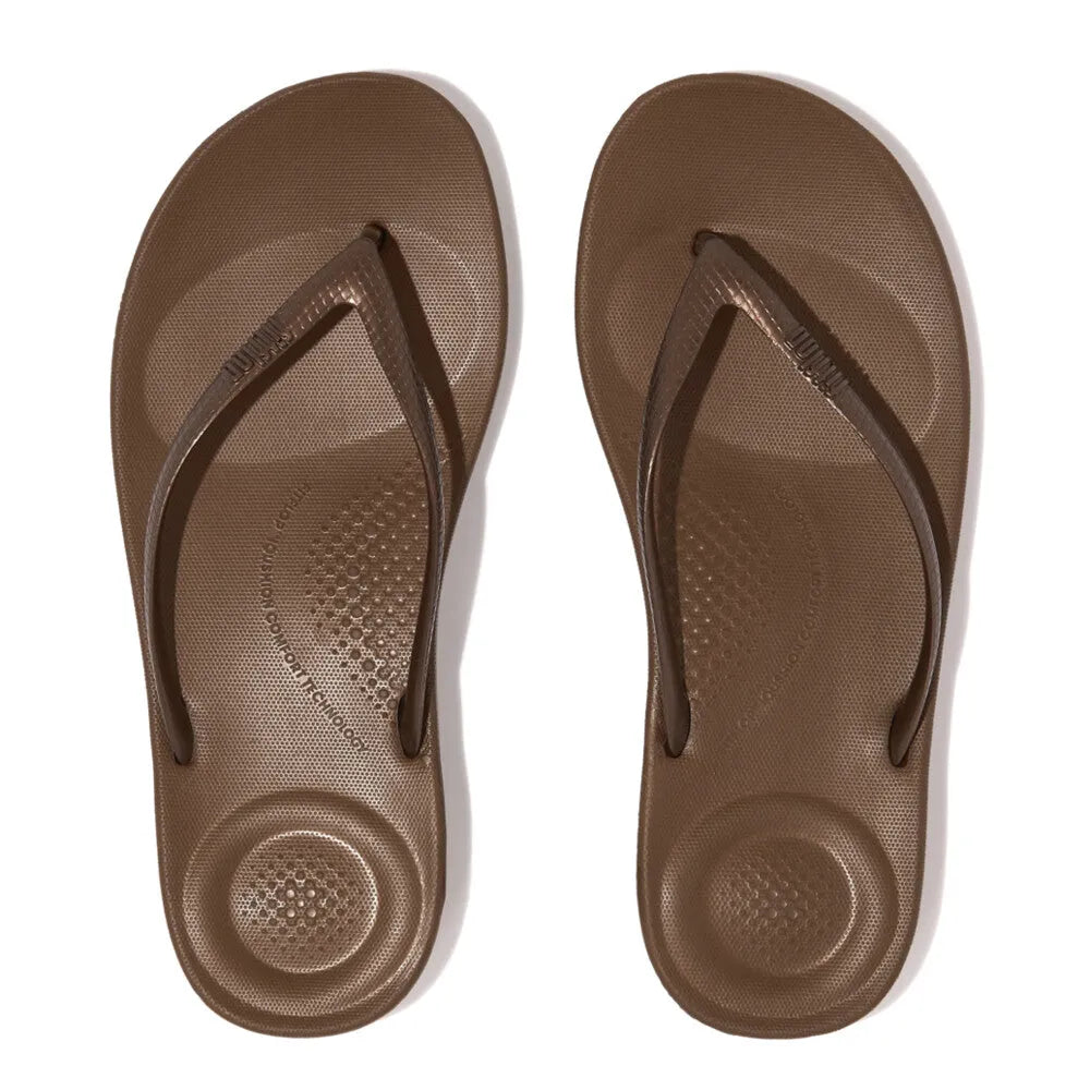 FitFlop E54-012 Iquishion Ladies Bronze T-Bar Sandals, ergonomic insoles, adjustable straps, and slip-resistant soles.