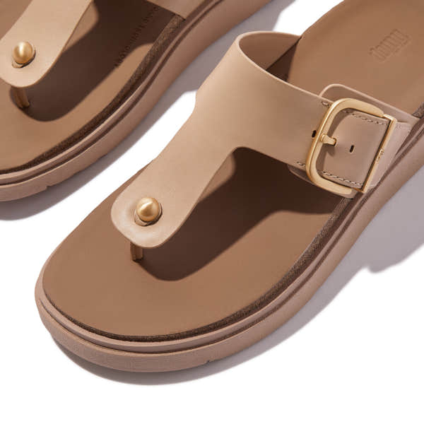 FitFlop HE7-B41 Gen-FF women's wide beige leather buckle sandals with gold-tone accents and supportive footbed.
