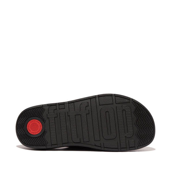 FitFlop HE8-001 Gen-FF women's wide black leather buckle sandals with cushioned sole and adjustable buckle strap.