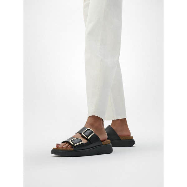 FitFlop HE8-001 Gen-FF women's wide black leather buckle sandals with cushioned footbed and chunky sole.