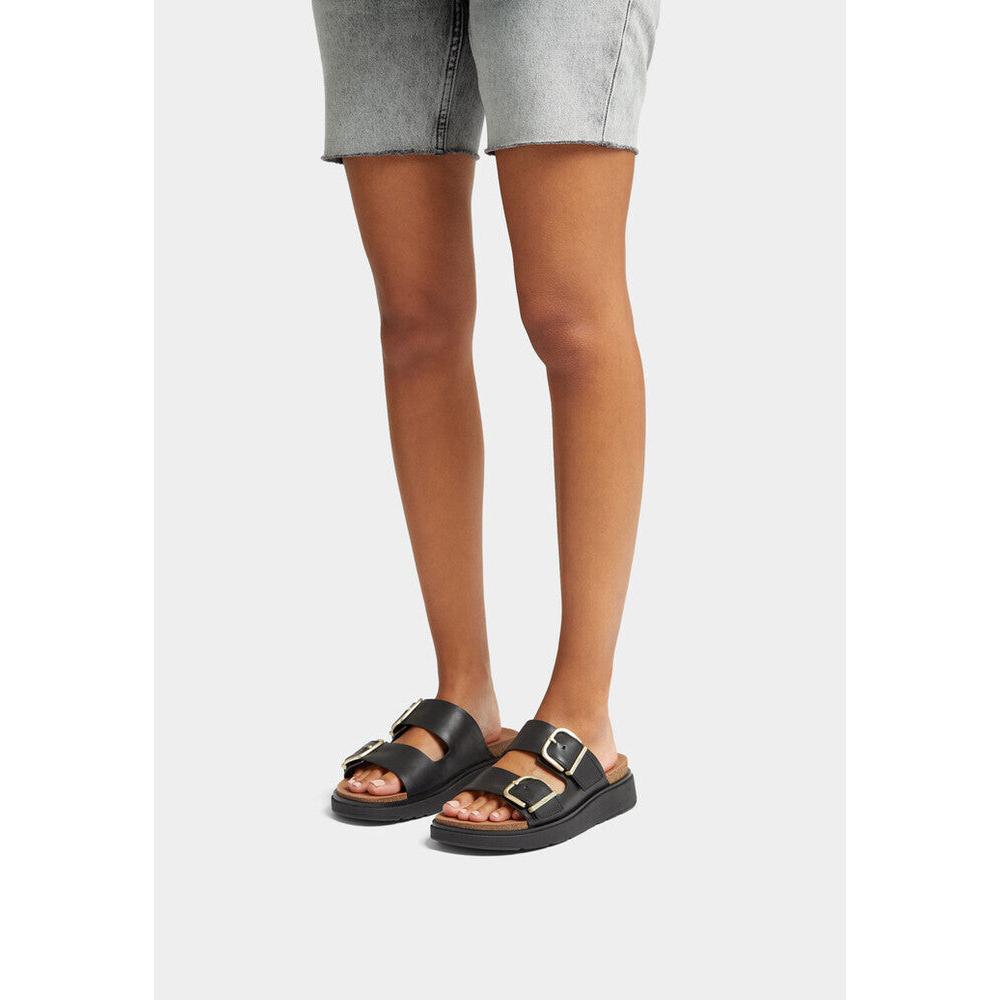 FitFlop HE8-001 Gen-FF women's wide black leather buckle sandals, slip-on design with adjustable buckles, cushioned footbed, casual style.