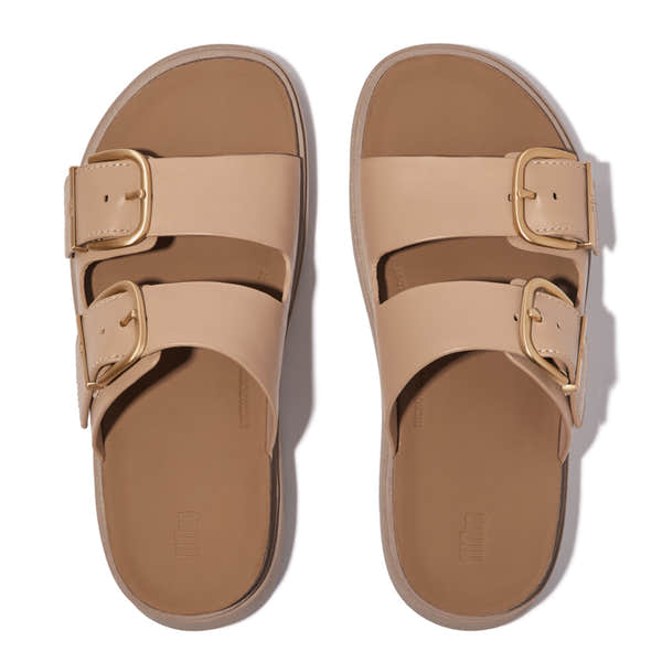 FitFlop HE8-B41 Gen-FF women's wide beige leather buckle sandals, cushioned footbed, two adjustable straps with gold buckles.