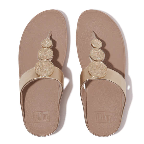FitFlop HJ1-C22 Halo Bead ladies' metallic latte beige slip-on sandals with decorative gold-tone beaded upper.