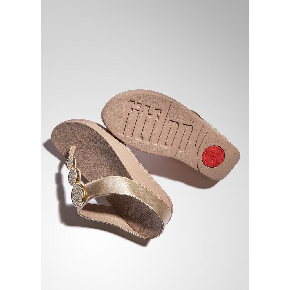 FitFlop HJ1-C22 Halo Bead women’s metallic latte beige slip-on sandals with decorative circular embellishments.
