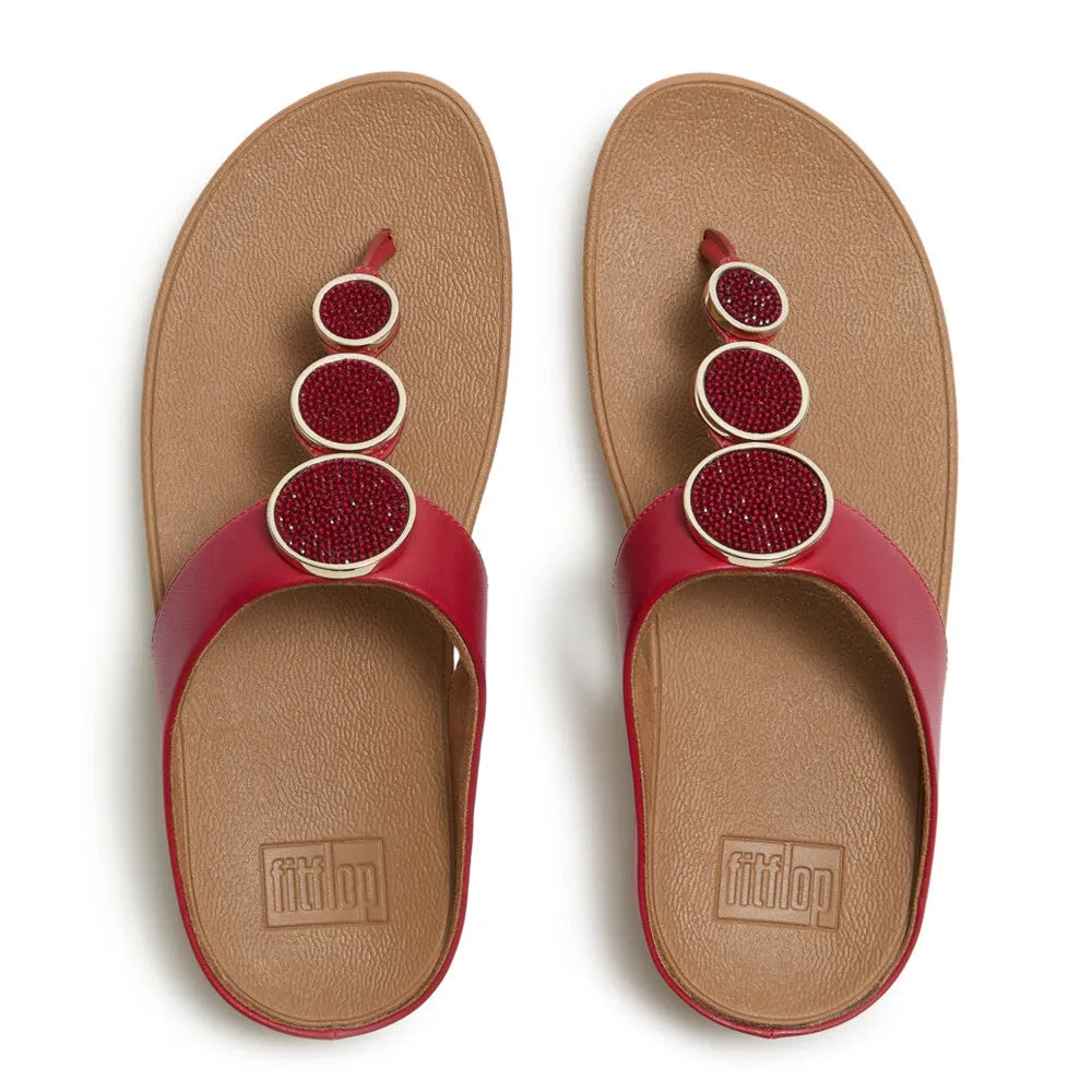 FitFlop Halo Bead-Circle Ladies Burnt Berry T-bar Sandals with beaded circle embellishments and red straps.