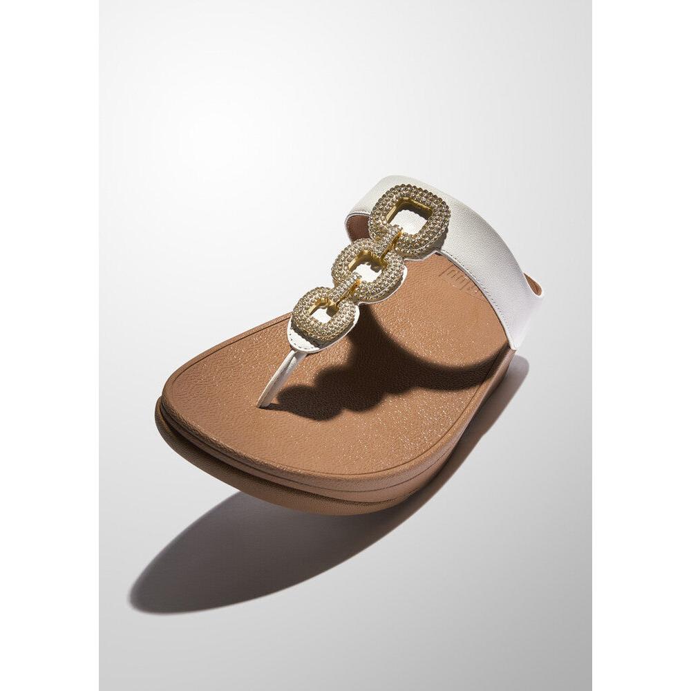 FitFlop HX2-194 Fino Crystal women's white leather slip-on sandals with decorative chain embellishment.