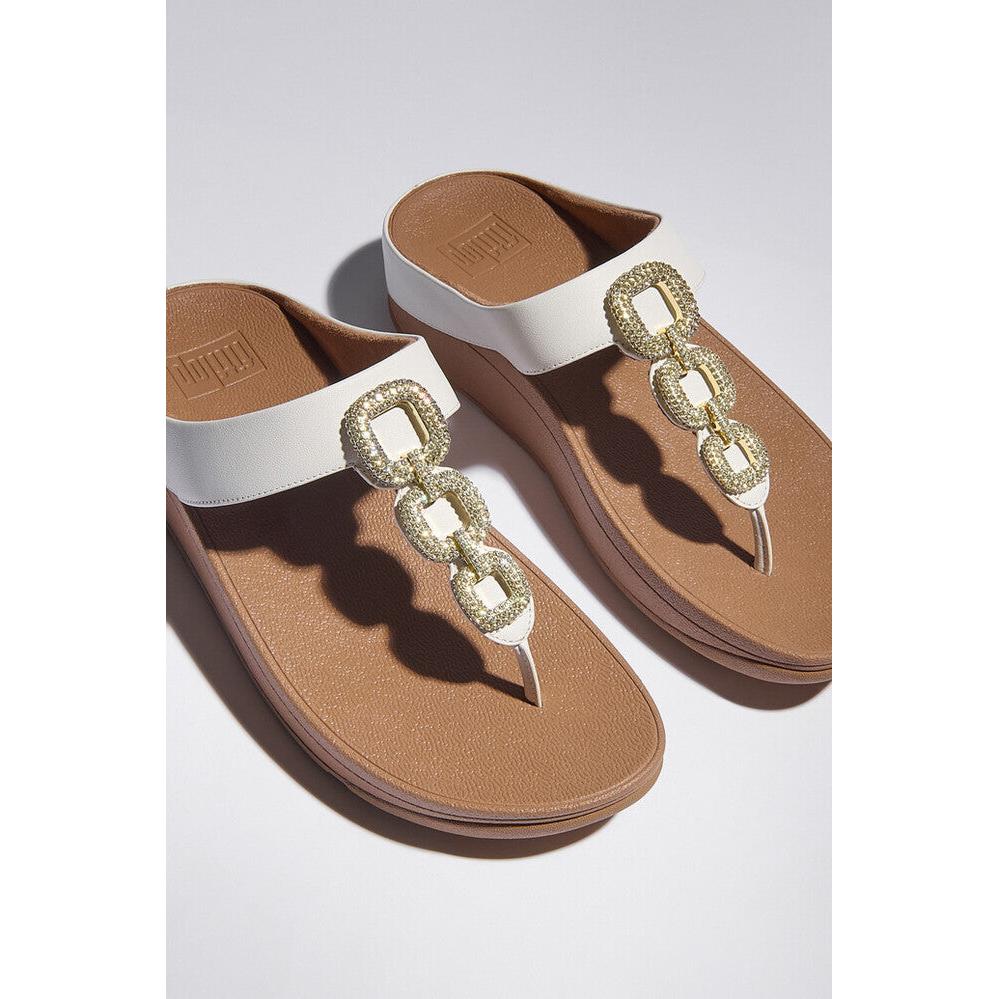 FitFlop HX2-194 Fino Crystal women's white leather slip-on sandals with decorative chain detail.