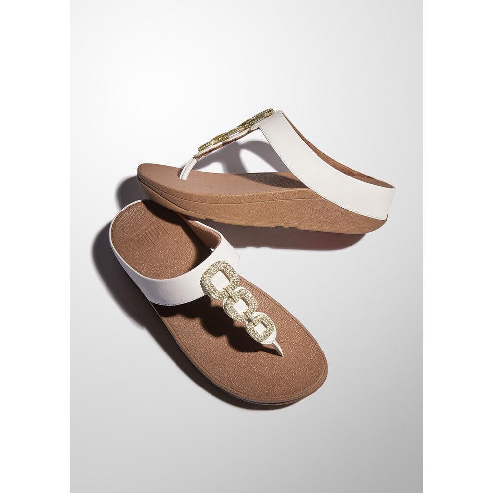FitFlop HX2-194 Fino Crystal women's white leather slip-on sandals with decorative chain embellishment.