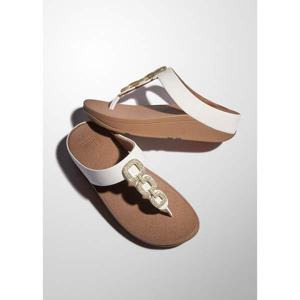 FitFlop HX2-194 Fino Crystal women's white leather slip-on sandals with decorative chain embellishment.