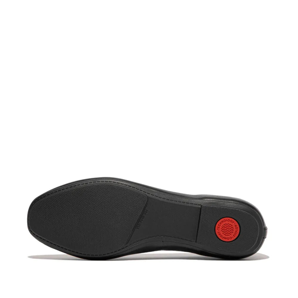 FitFlop HX8-001 Delicato Bow black leather slip-on women's shoes with cushioned sole and bow detail.