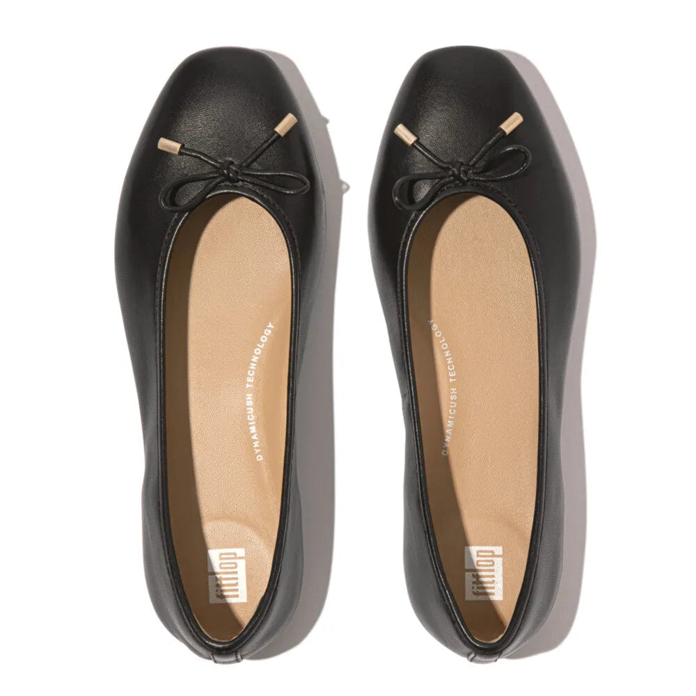 FitFlop HX8-001 Delicato Bow women's black leather slip-on shoes with bow detail and cushioned insole.