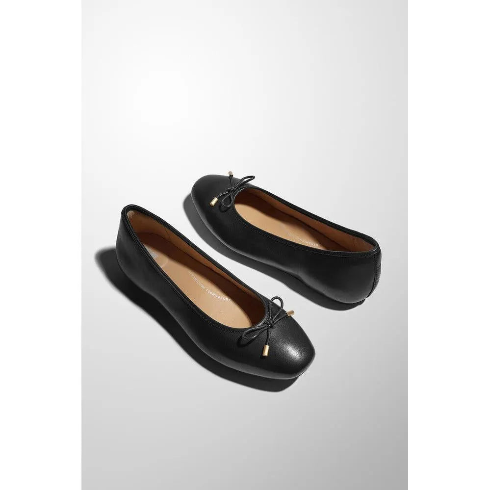 FitFlop HX8-001 Delicato Bow Women's Black Leather Slip-On Shoes, ballet flat style with bow detail.