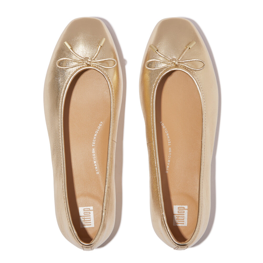 FitFlop Delicato Bow women's narrow platinum leather slip-on ballet flats with bow detail.