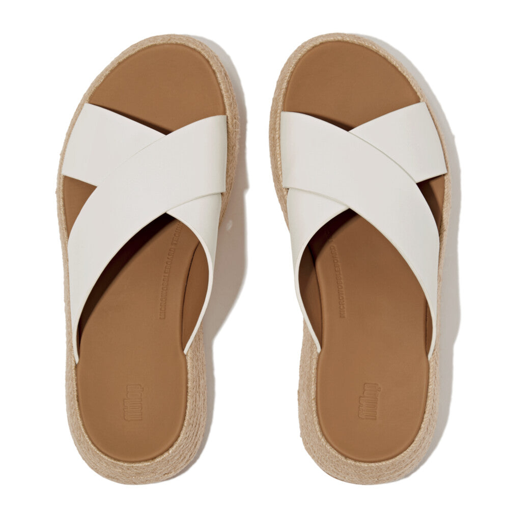 FitFlop women's white leather espadrille slip-on sandals with crossover straps and woven jute sole.
