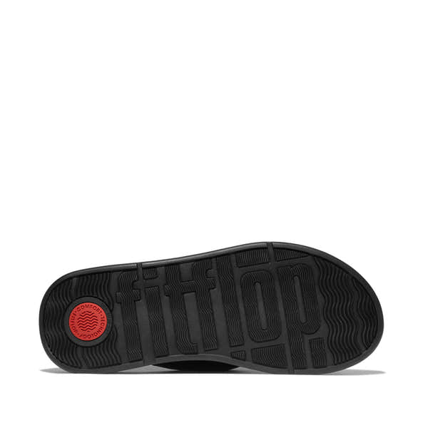 FitFlop IY1-090 F-Mode Knot women's black leather slip-on sandals with cushioned sole and textured tread.
