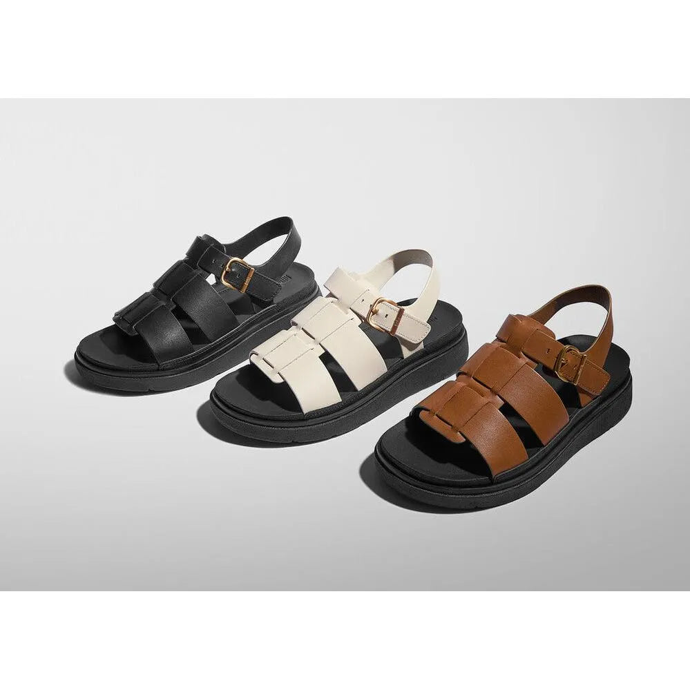 FitFlop IZ1-090 Gen-FF women's black, white, and brown leather buckle sandals with chunky soles.