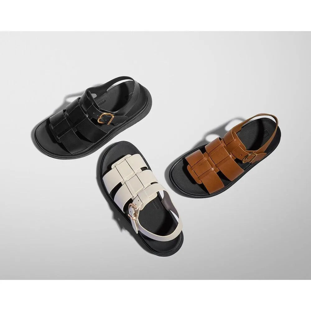 FitFlop IZ1-090 Gen-FF ladies black, white, and brown leather buckle sandals on a white background.