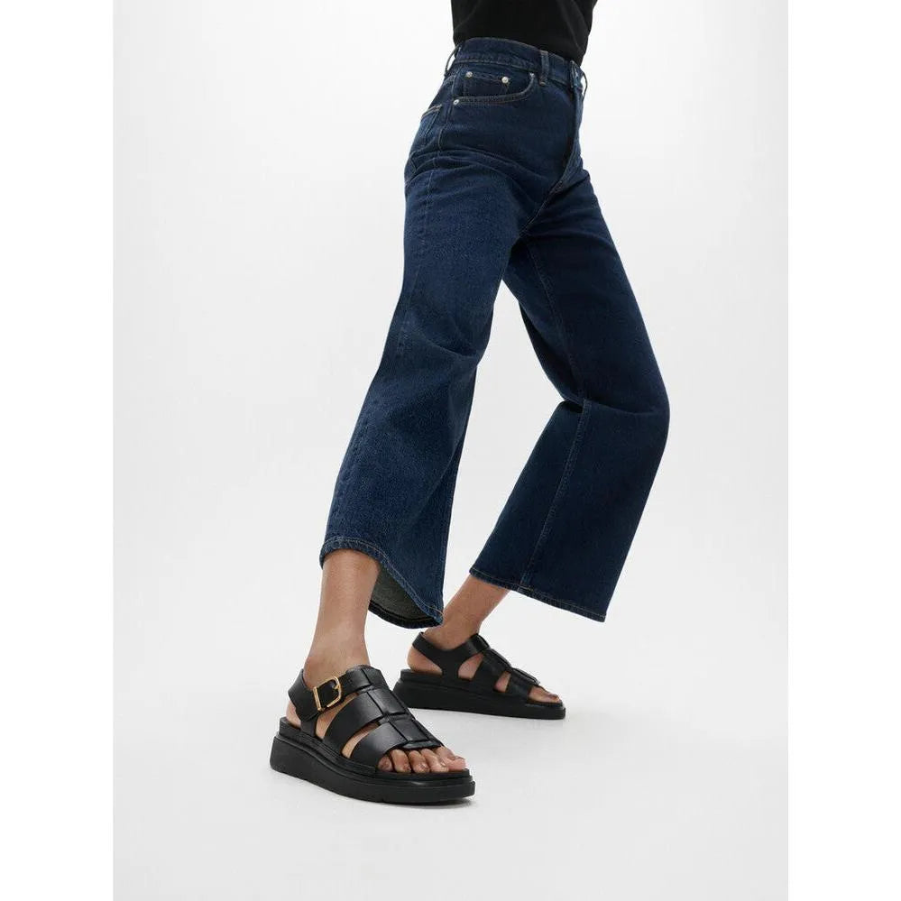 FitFlop IZ1-090 Gen-FF women's black leather buckle sandals with chunky sole and ankle strap.