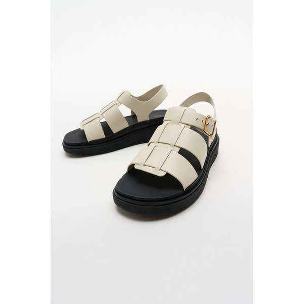 FitFlop IZ1-A99 Gen-FF women's wide beige leather buckle sandals with platform sole and adjustable strap.