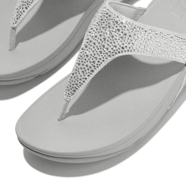 FitFlop Lulu Crystal Ladies Silver Slip-On Sandals with rhinestone-embellished straps.