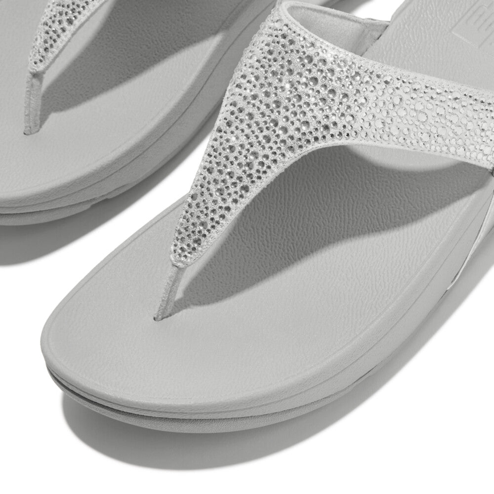 FitFlop Lulu Crystal Ladies Silver Slip-On Sandals with sparkling crystal-embellished straps and cushioned white soles.