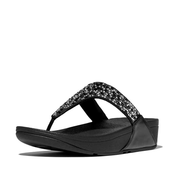 FitFlop Lulu Crystal women's black slip-on sandals with embellished straps and cushioned wedge sole.