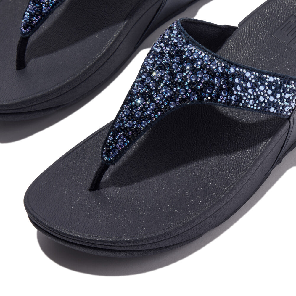 FitFlop Lulu Crystal slip-on sandals for women, midnight navy color with sparkling crystal embellishments on straps.