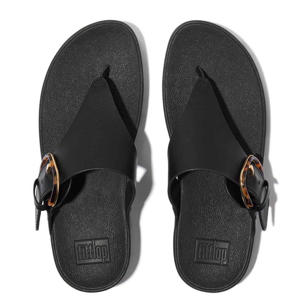 FitFlop Lulu Resin black leather slip-on sandals with buckle detail for women.