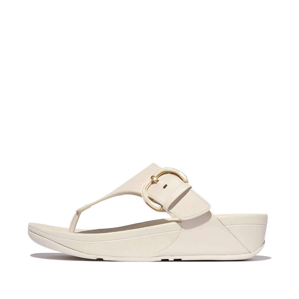 FitFlop Lulu Resin beige leather slip-on sandals for women with a chunky sole and gold buckle detail.